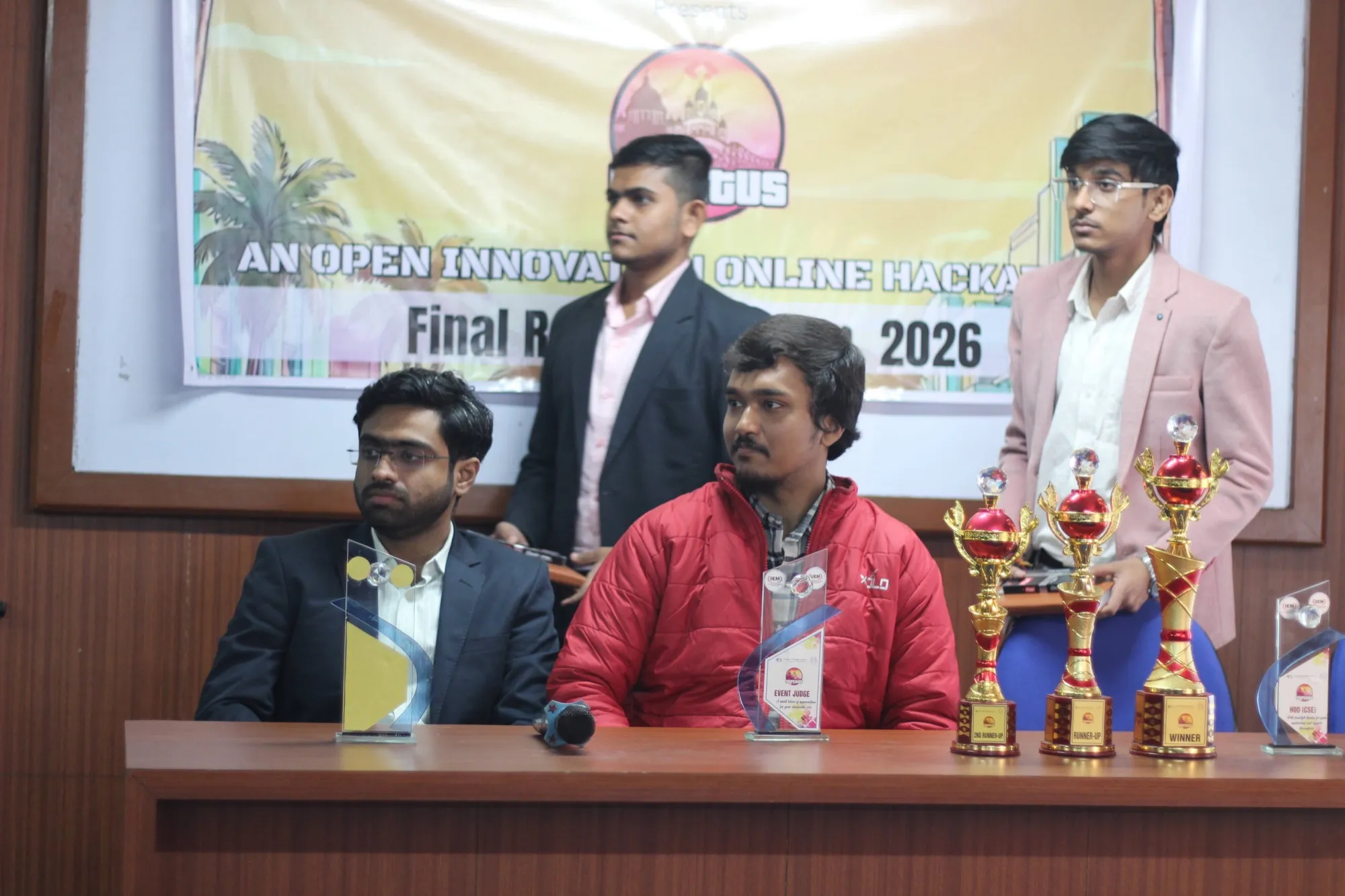 IEM Impetus: The judges' table, trophies lined up